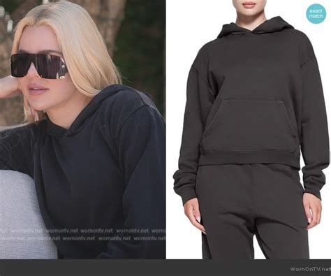 Khloe’s black shield sunglasses and hoodie on The Kardashians